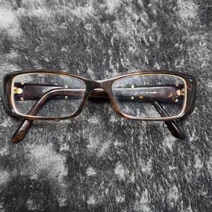 Gucci Elegant Brown Eyeglasses